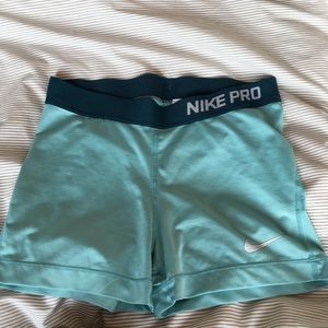 Nike size medium ladies dri fit compression shorts